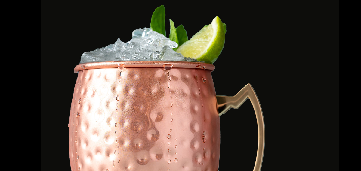 Cocktail in a copper mug with lime slice