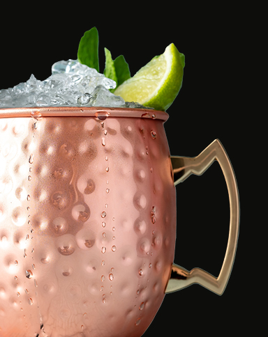 Cocktail in a copper mug with lime slice